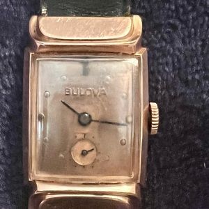 Vintage Bulova salmon men’s watch with blue dial